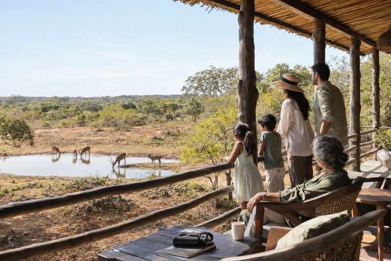 A three-generation family on a lodge veranda near Yala
